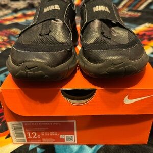 Used Toddler size 12 Nike Flex Runners.